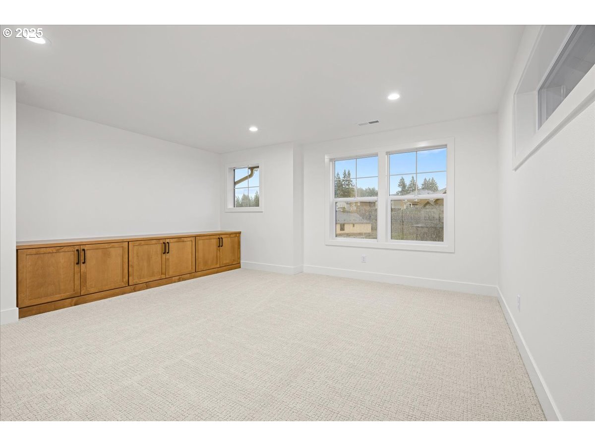 3518 North 11th Circle Ridgefield, WA 98642 - Photo 24 of 44 a view of an empty room with a window