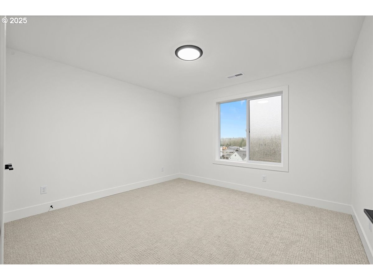 3518 North 11th Circle Ridgefield, WA 98642 - Photo 31 of 44 a view of an empty room