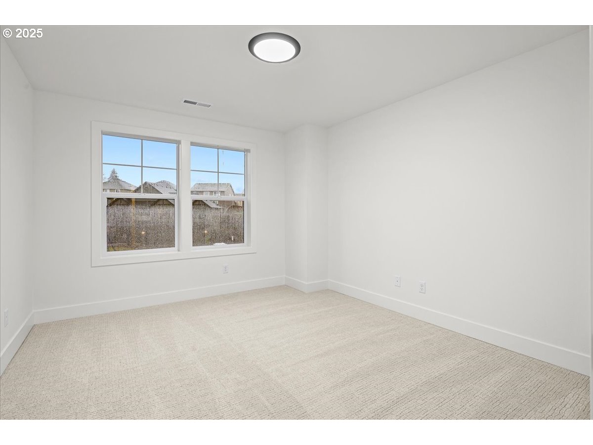 3518 North 11th Circle Ridgefield, WA 98642 - Photo 33 of 44 a view of an empty room with a window