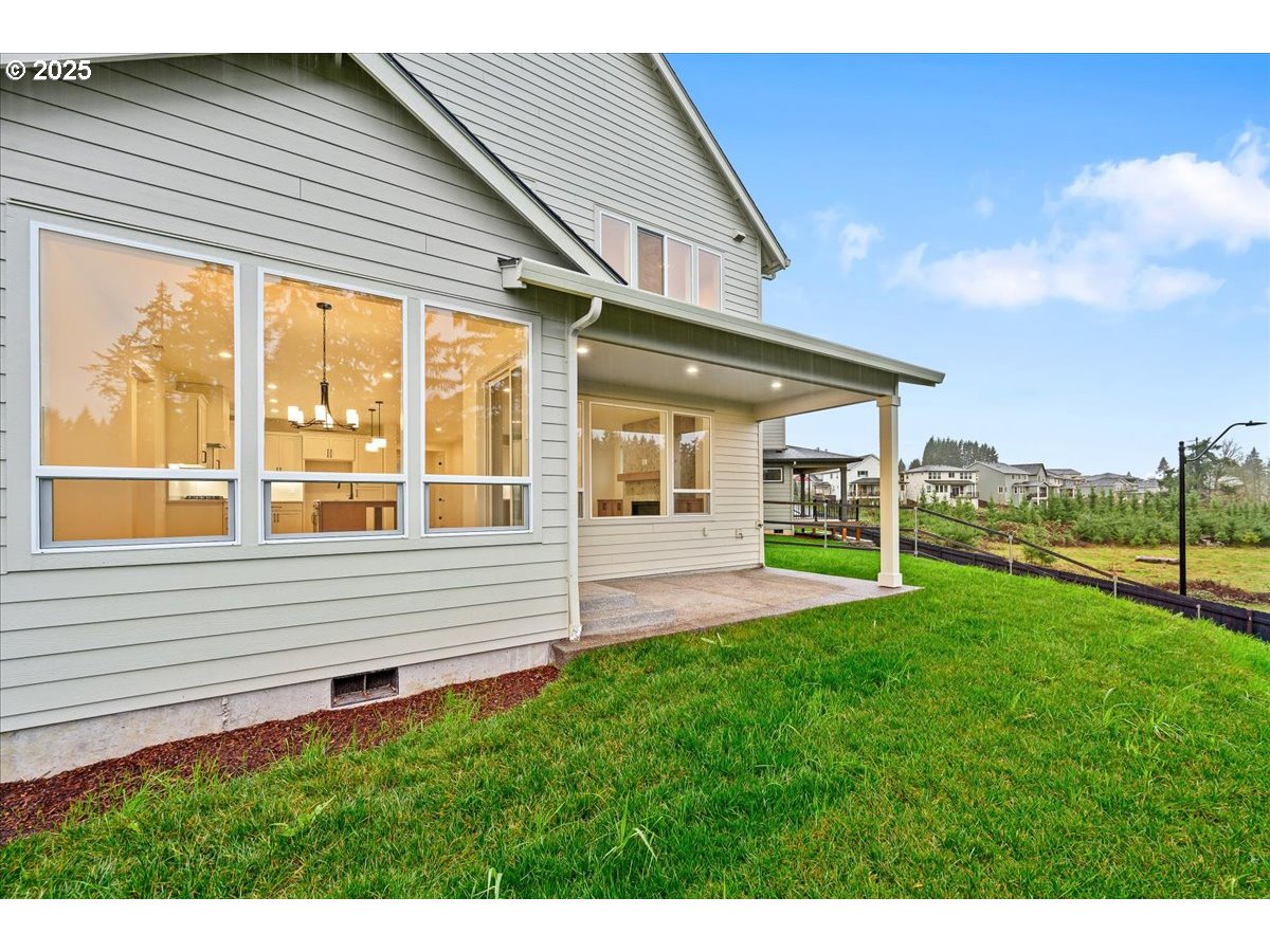 3518 North 11th Circle Ridgefield, WA 98642 - Photo 37 of 44 a view of house with backyard