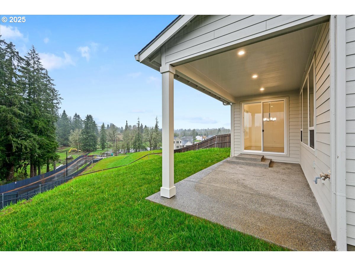 3518 North 11th Circle Ridgefield, WA 98642 - Photo 39 of 44 a view of a backyard with garden