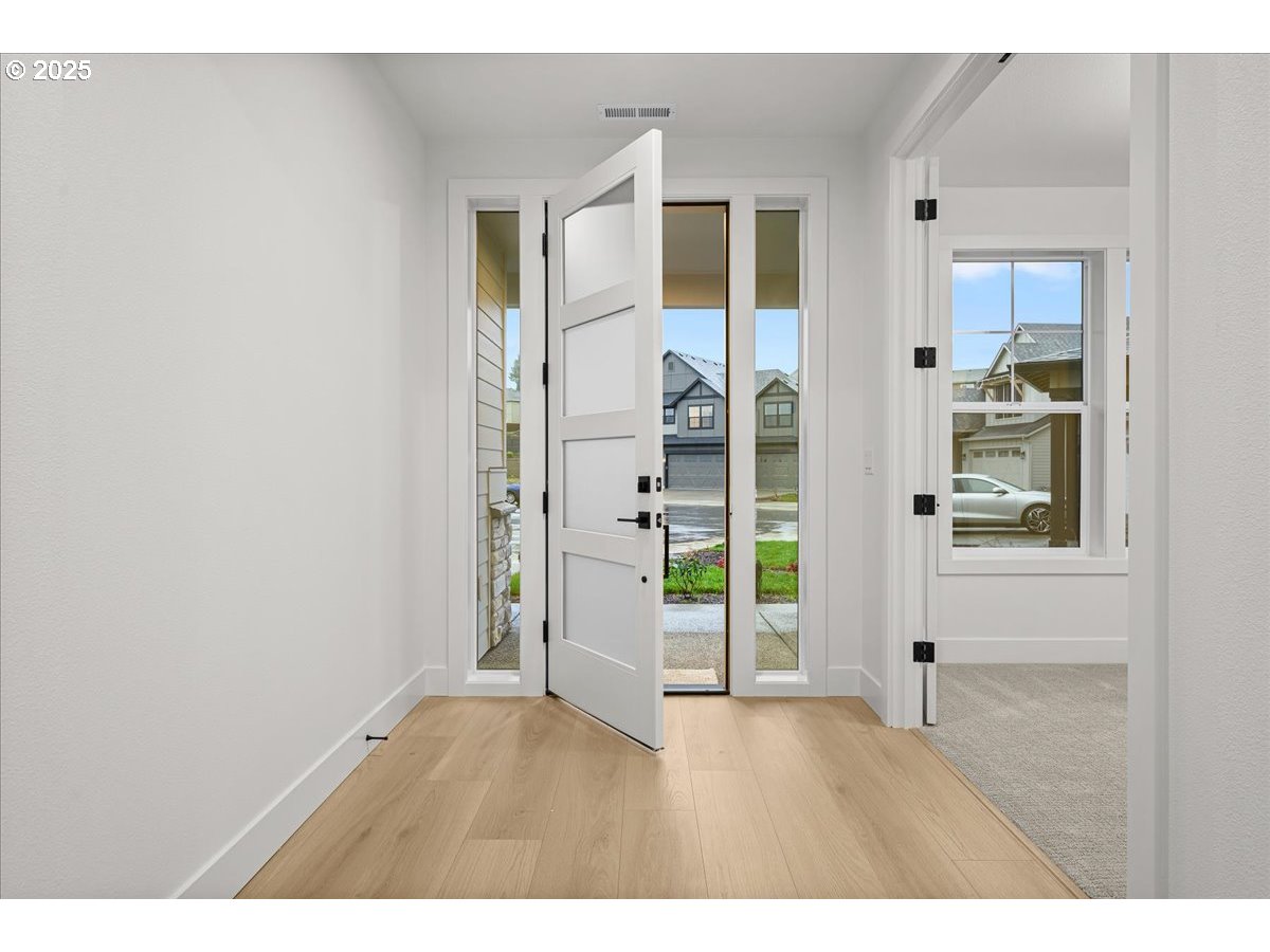 3518 North 11th Circle Ridgefield, WA 98642 - Photo 4 of 44 a view of an empty room and window