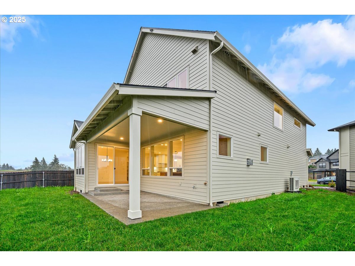 3518 North 11th Circle Ridgefield, WA 98642 - Photo 41 of 44 a view of a house with a yard