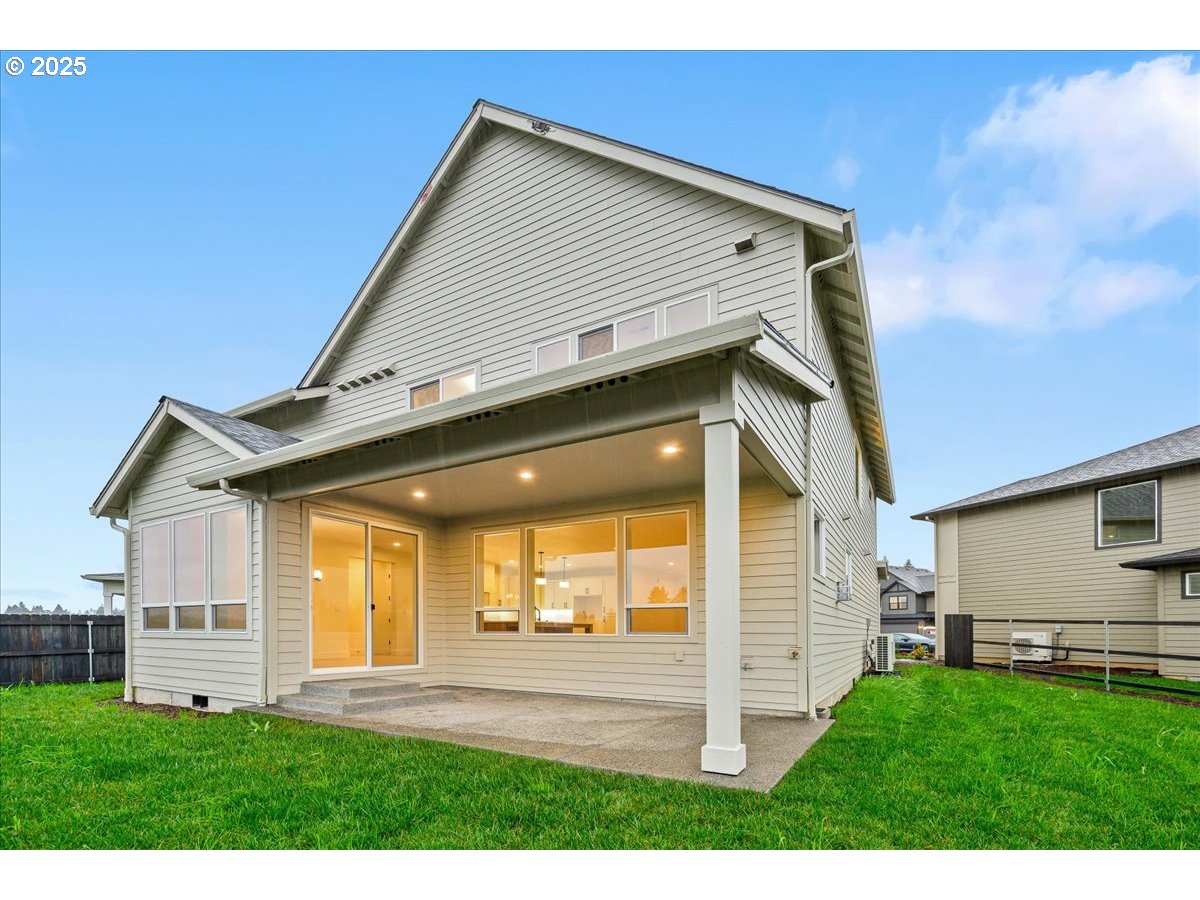 3518 North 11th Circle Ridgefield, WA 98642 - Photo 42 of 44 a view of a house with backyard