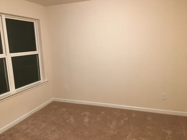 an empty room with a window