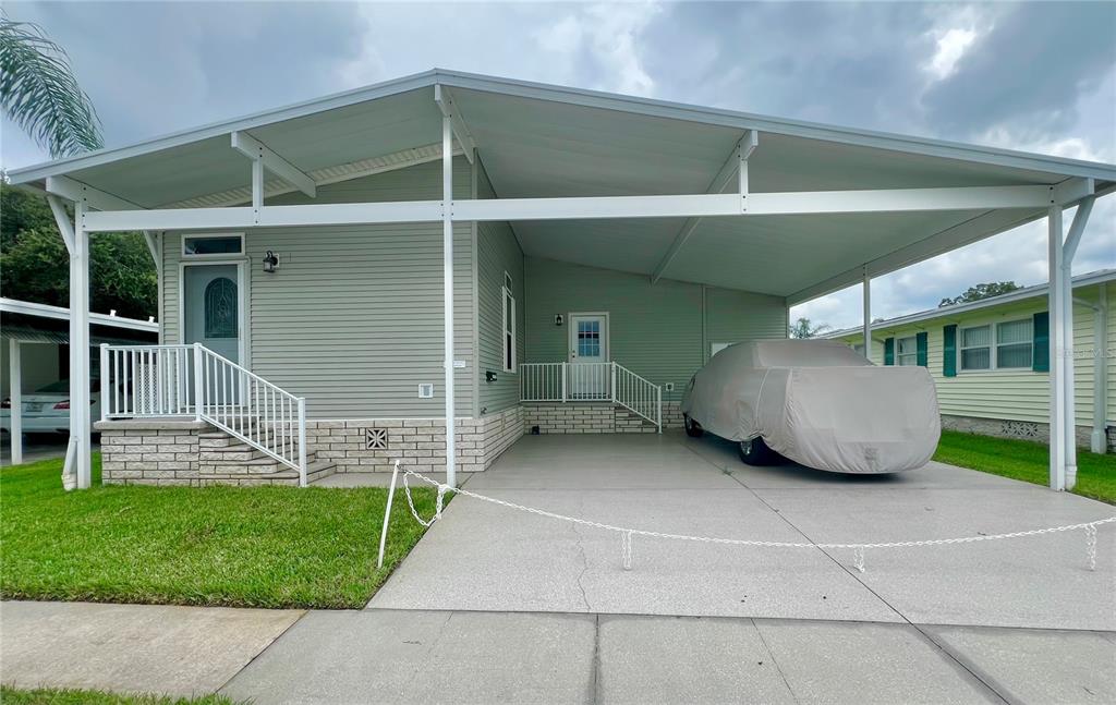 1100 South Belcher Road, Unit 60 Largo, FL 33771 - Photo 1 of 1 Front of home with side by side parking.