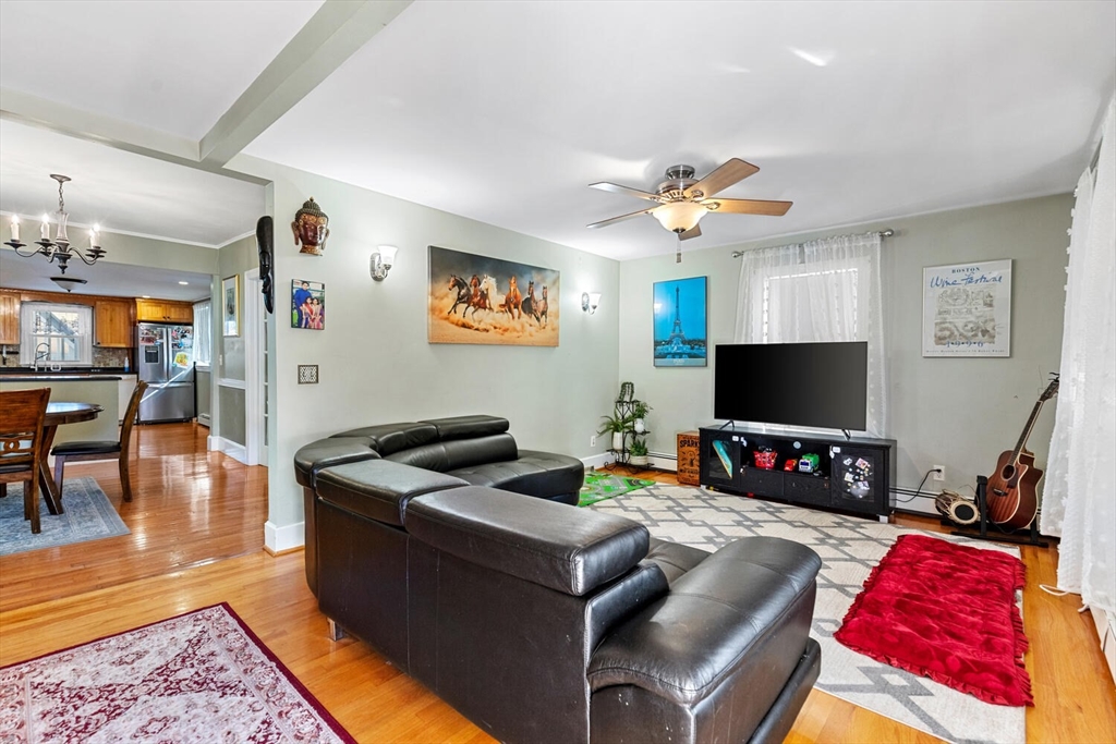 81 Everett Street Everett, MA 02149 - Photo 11 of 37 a living room with furniture and a flat screen tv