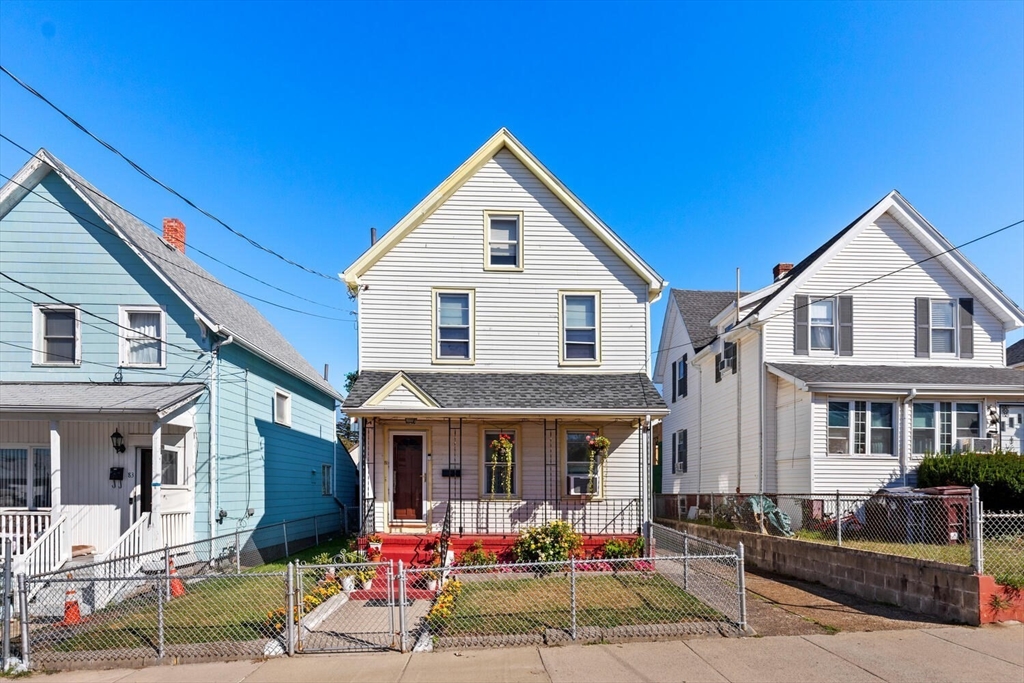 81 Everett Street Everett, MA 02149 - Photo 2 of 37 a front view of multiple houses