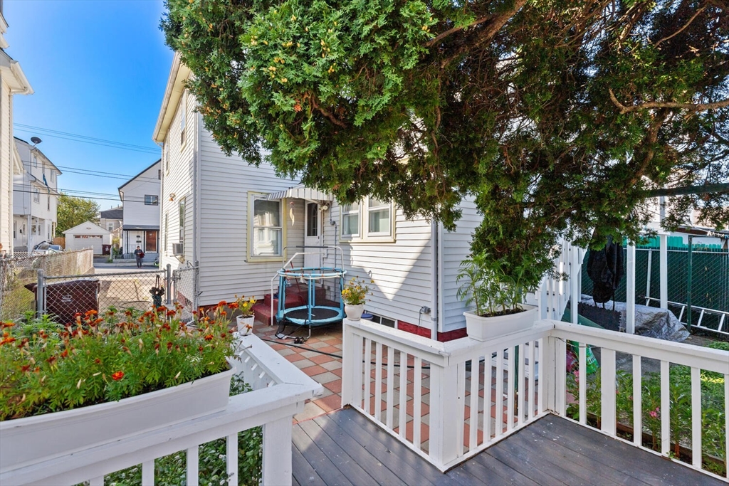 81 Everett Street Everett, MA 02149 - Photo 32 of 37 a view of a house with backyard and deck