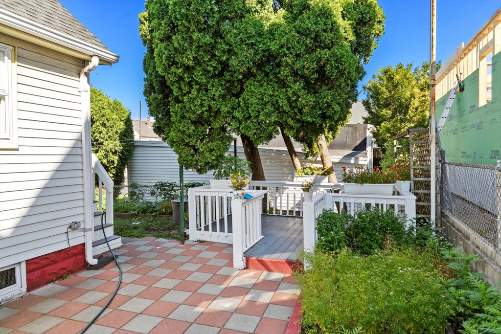 81 Everett Street Everett, MA 02149 - Photo 34 of 37 a view of house with backyard and sitting area