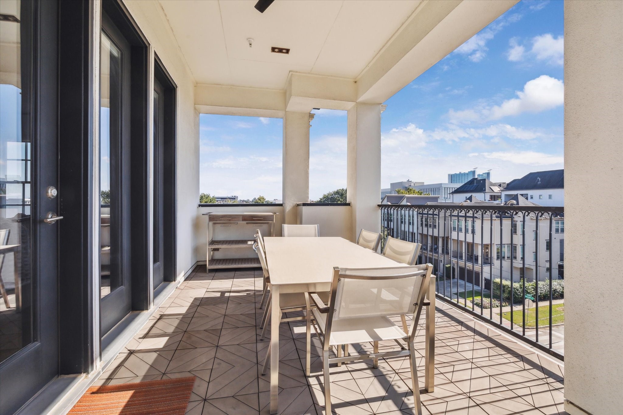 1619 Calumet Street Houston, TX 77004 - Photo 25 of 26 a view of a balcony dining table and chairs