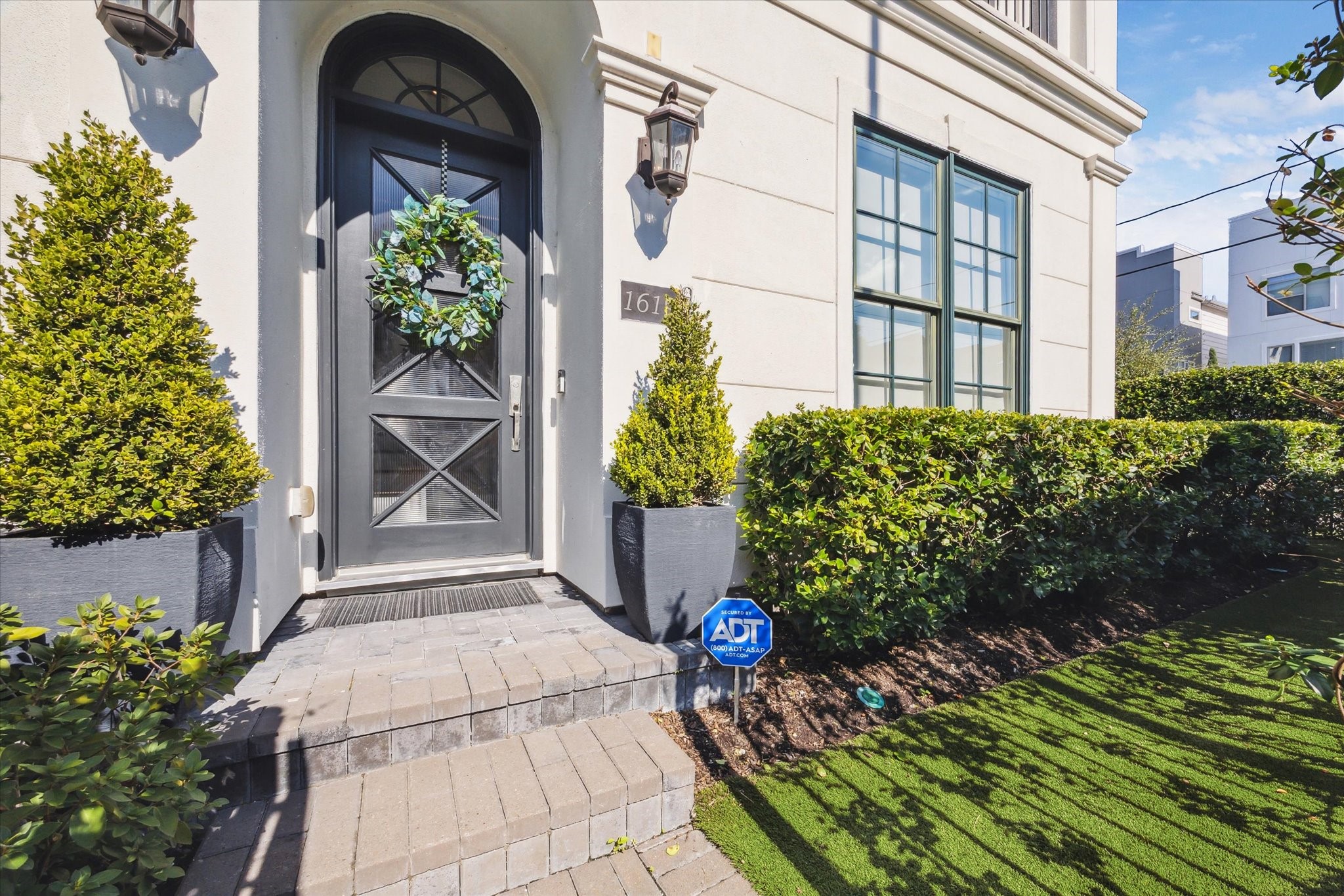 1619 Calumet Street Houston, TX 77004 - Photo 3 of 26 a front view of a house with a garden