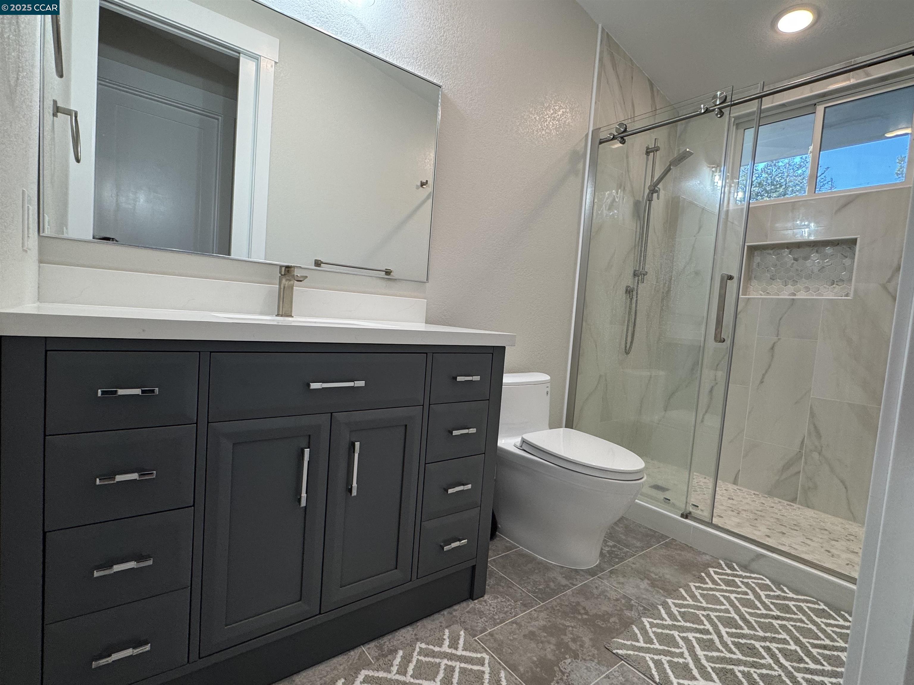 Tice Valley Walnut Creek, CA 94595 - Photo 14 of 17 a bathroom with a sink toilet and shower