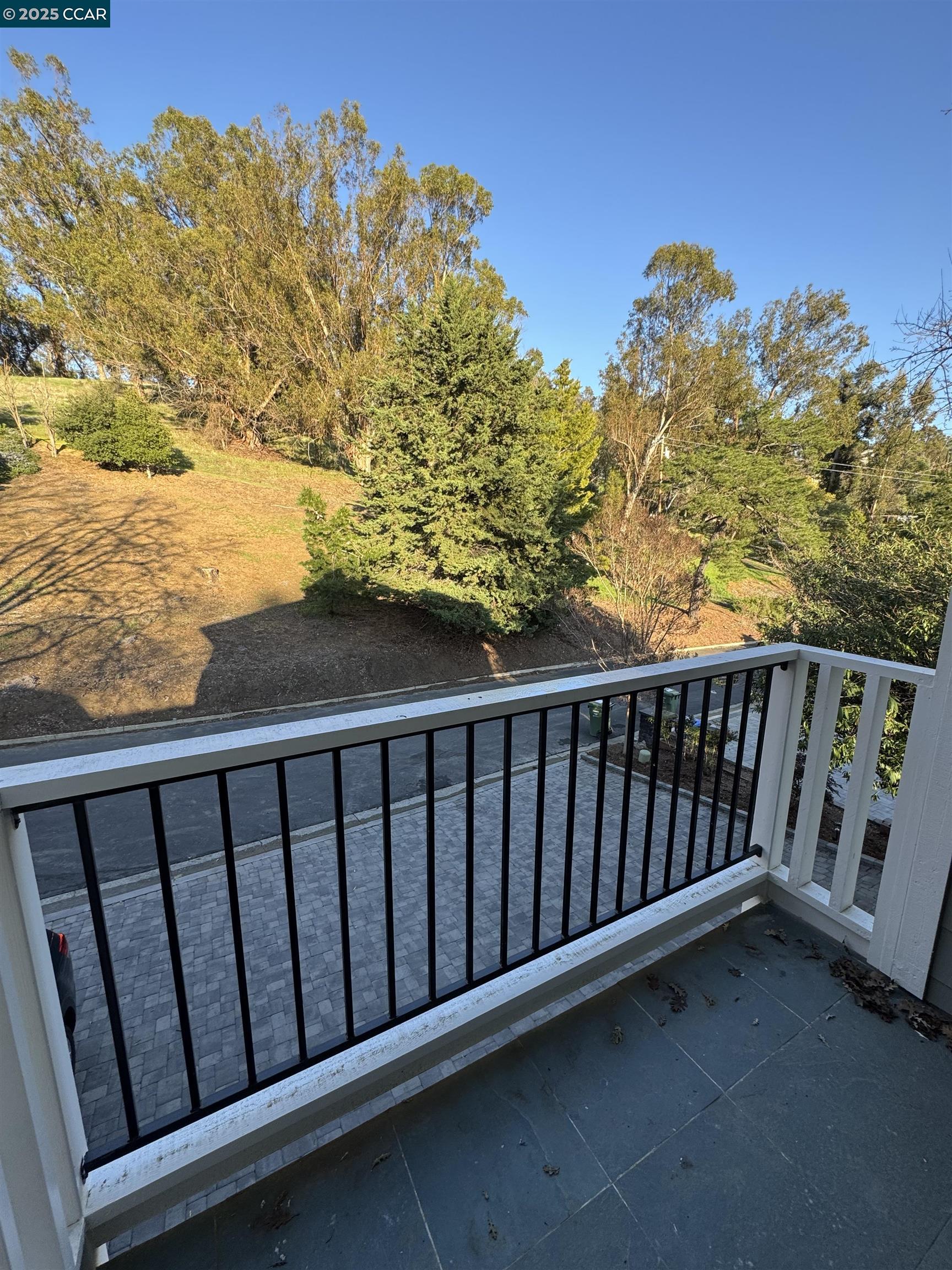 Tice Valley Walnut Creek, CA 94595 - Photo 3 of 17 a balcony with wooden floor in front of it