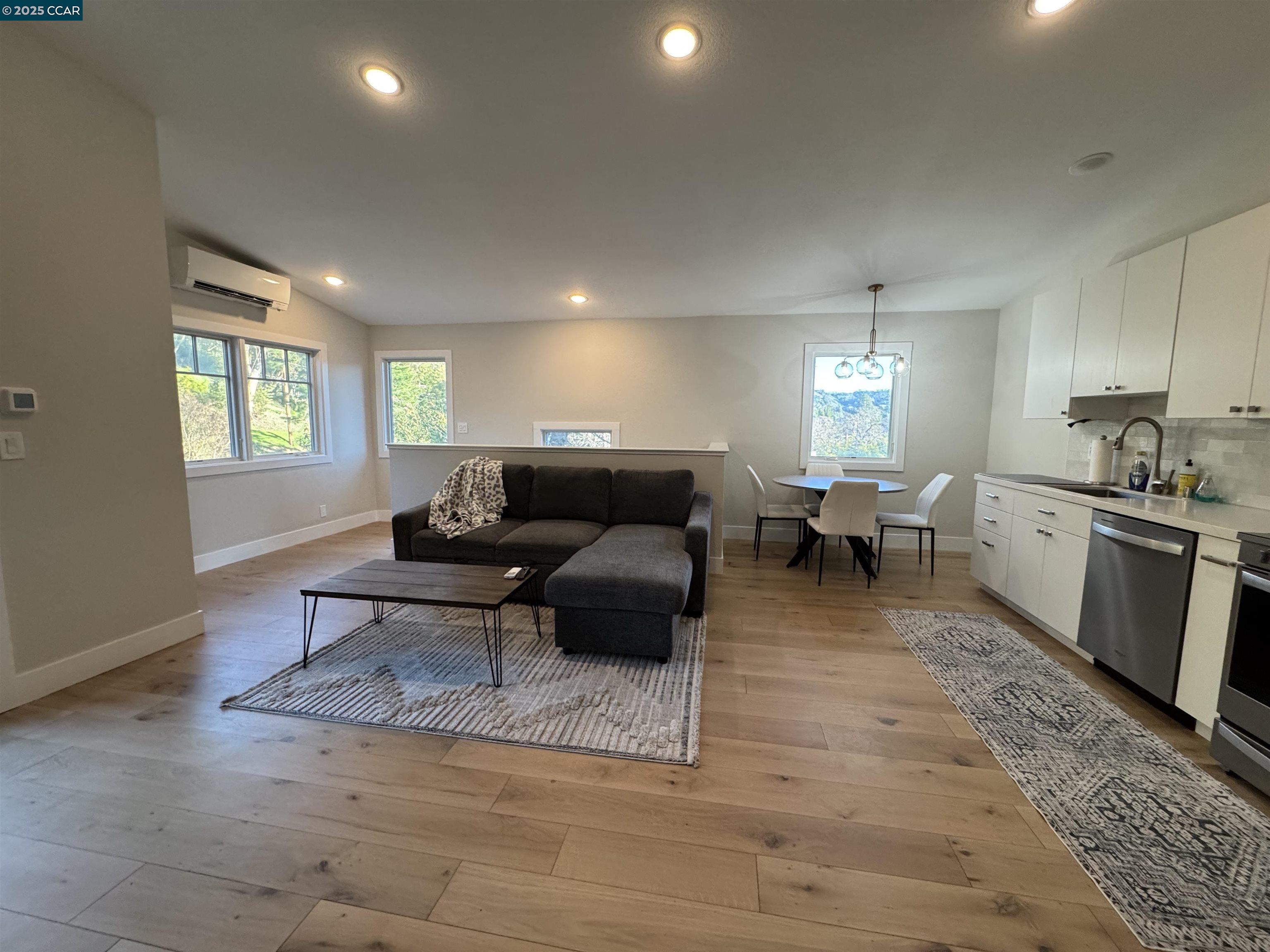 Tice Valley Walnut Creek, CA 94595 - Photo 5 of 17 a living room with furniture and a window