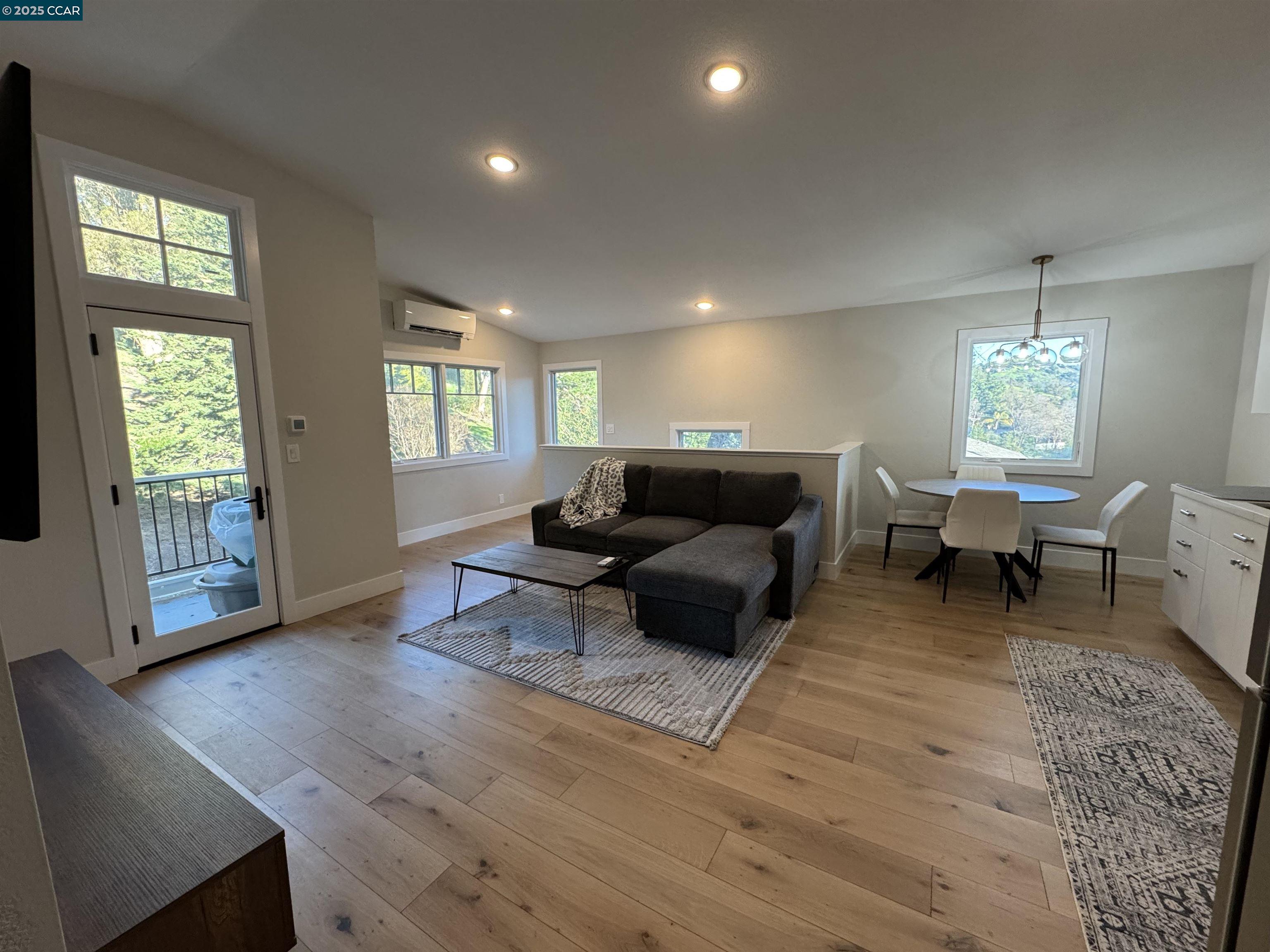 Tice Valley Walnut Creek, CA 94595 - Photo 7 of 17 a living room with furniture and a large window