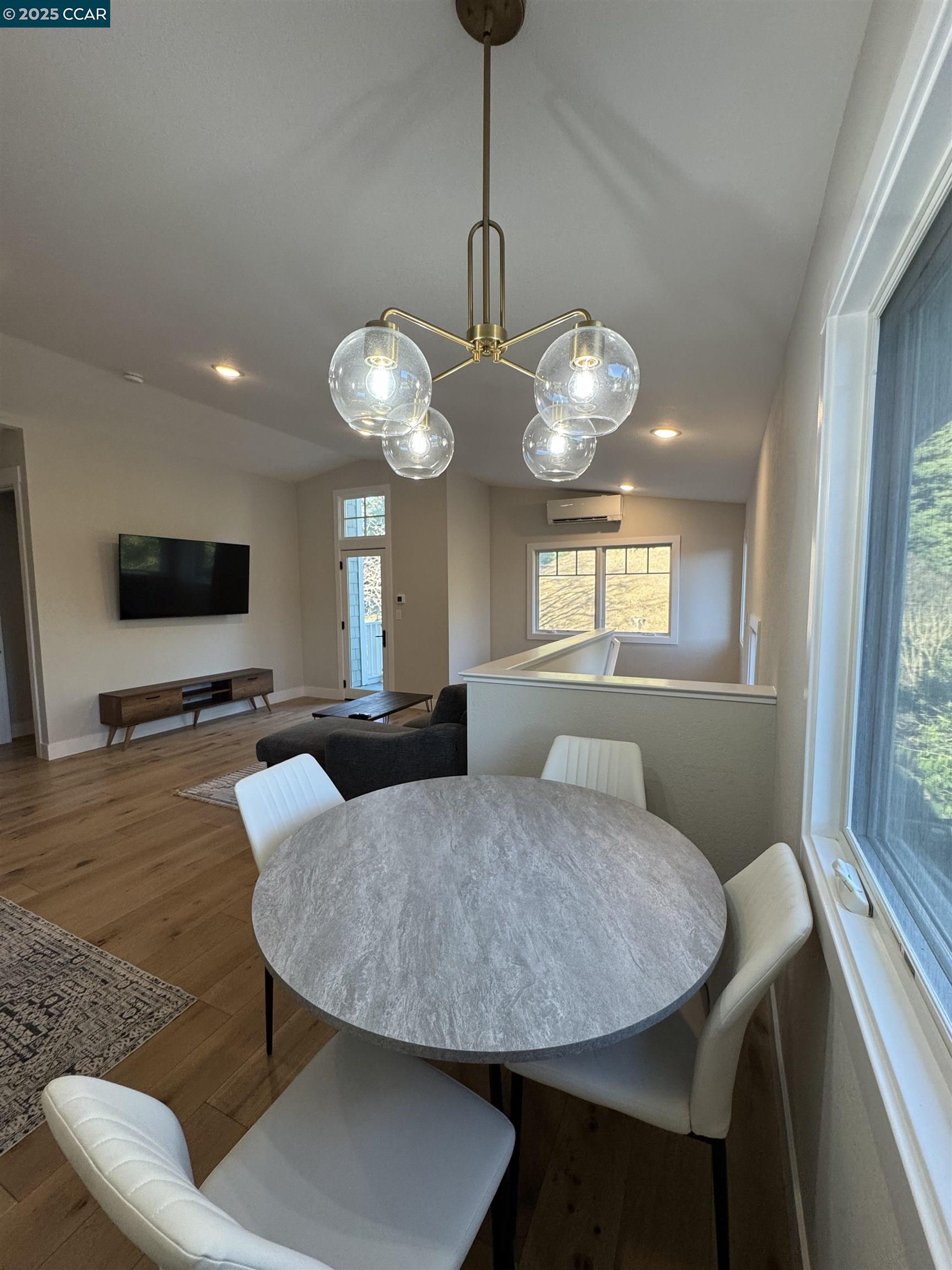 Tice Valley Walnut Creek, CA 94595 - Photo 10 of 17 a view of a dining room with furniture and a chandelier