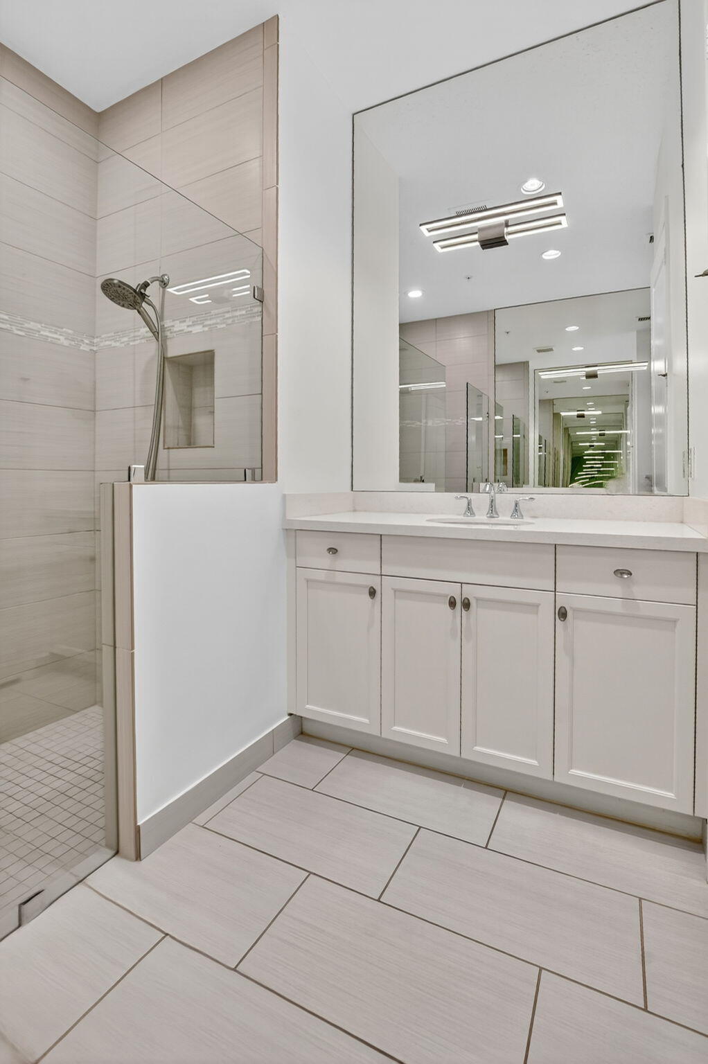 6675 Quiet Wave Trail Boca Raton, FL 33433 - Photo 29 of 65 a bathroom with a sink and a mirror