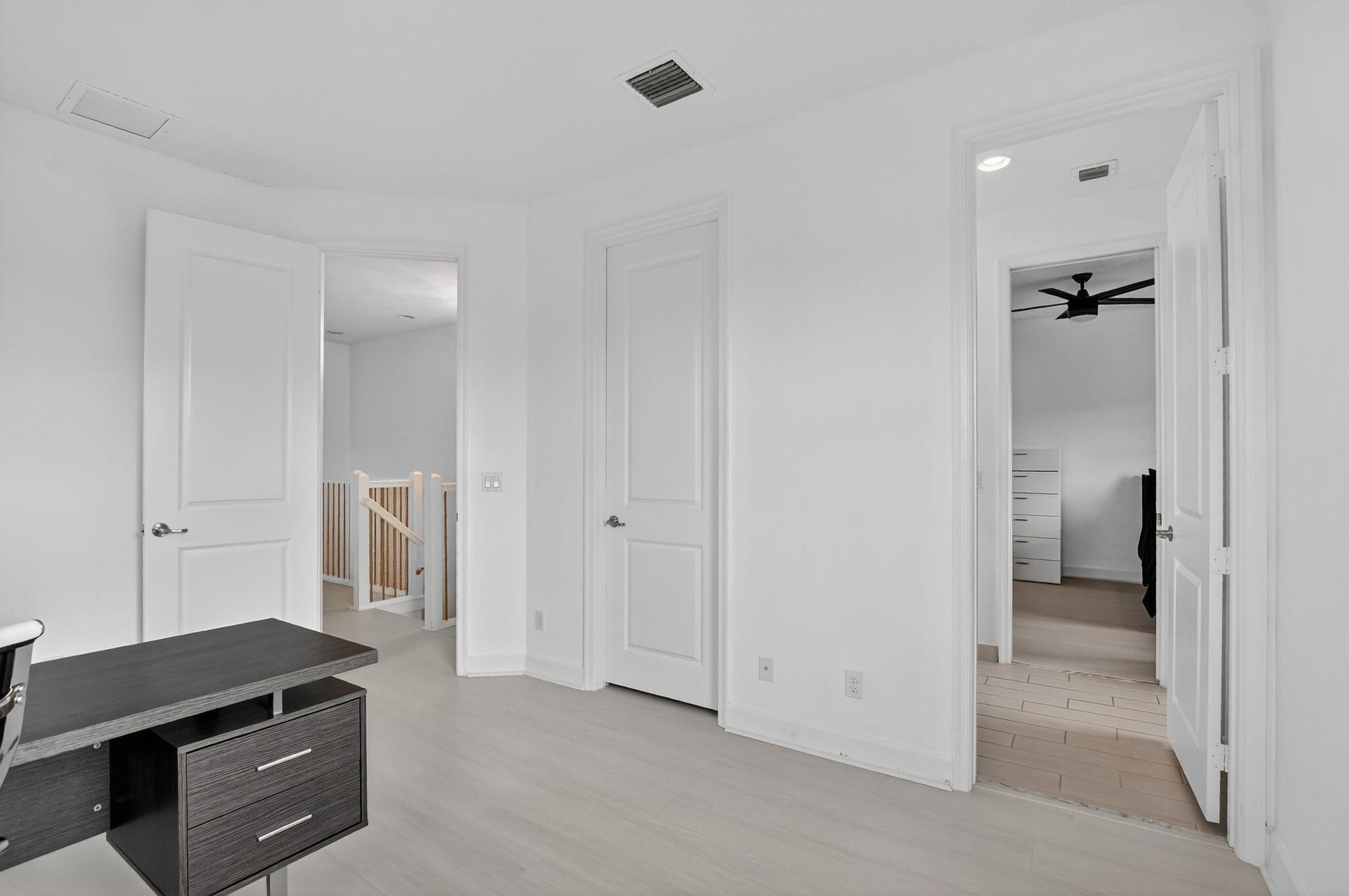 6675 Quiet Wave Trail Boca Raton, FL 33433 - Photo 36 of 65 a view of a kitchen from the hallway