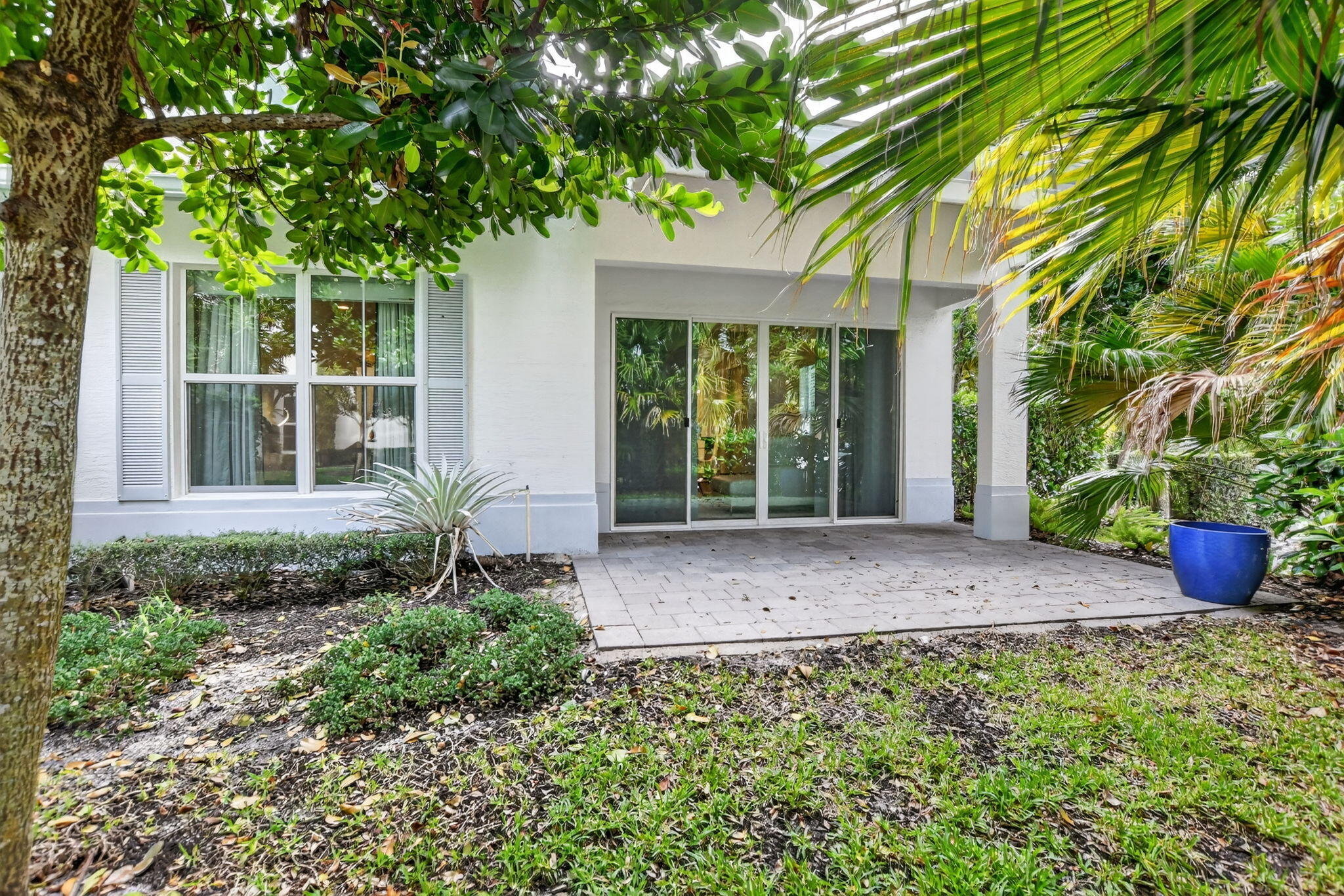 6675 Quiet Wave Trail Boca Raton, FL 33433 - Photo 47 of 65 front view of a house with potted plants