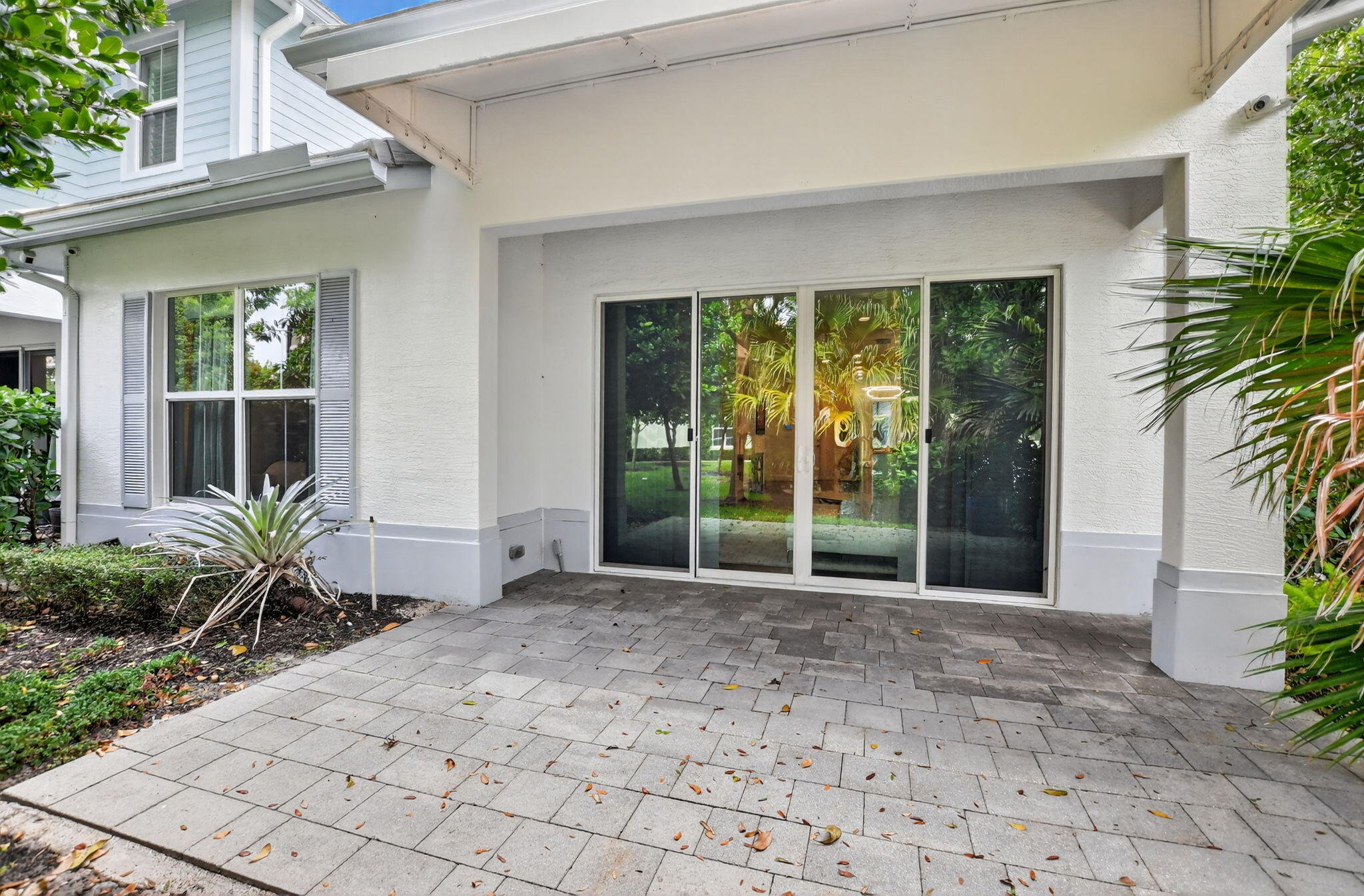 6675 Quiet Wave Trail Boca Raton, FL 33433 - Photo 49 of 65 a front view of a house with garden