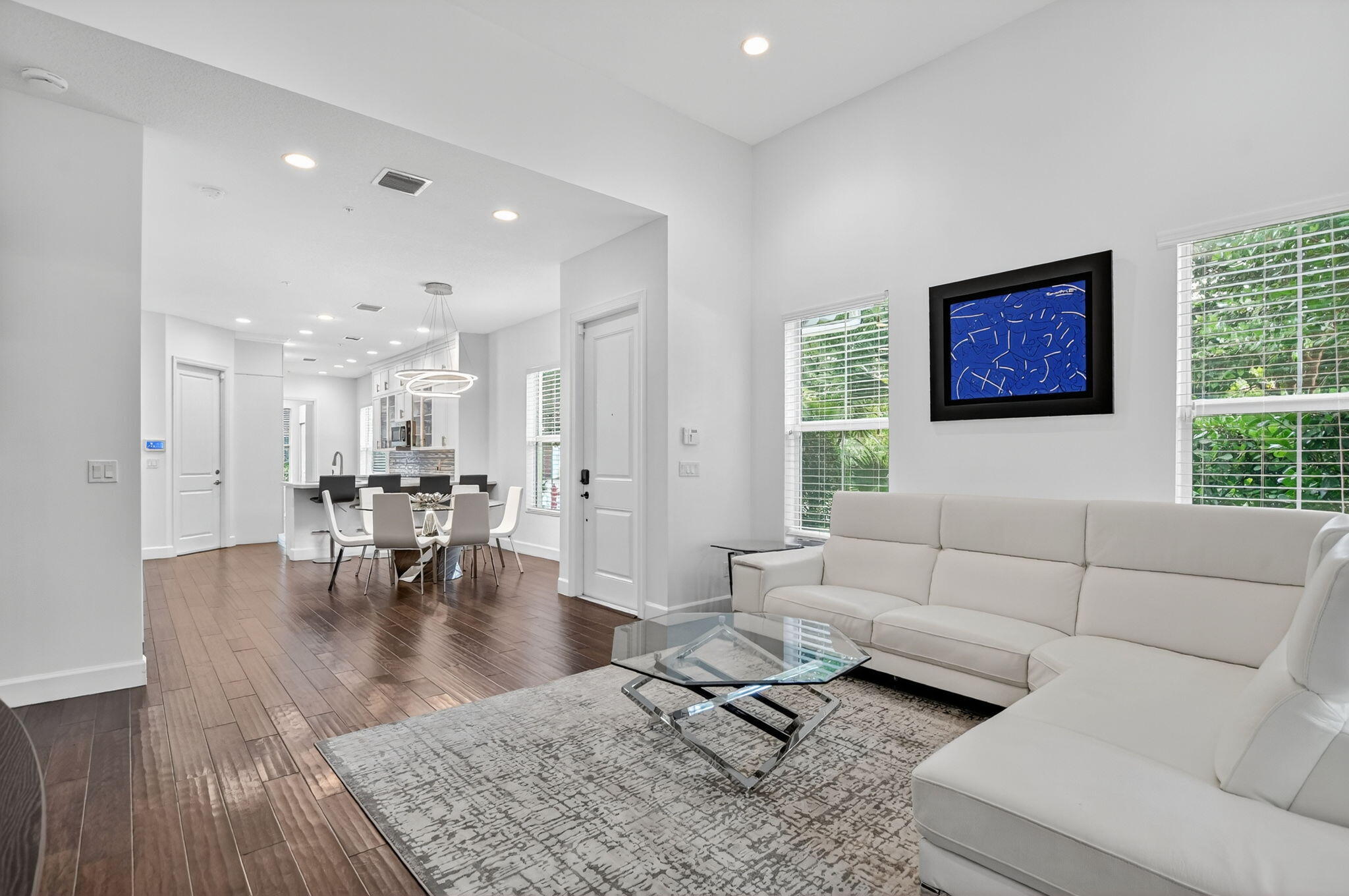 6675 Quiet Wave Trail Boca Raton, FL 33433 - Photo 8 of 65 a living room with furniture and a table
