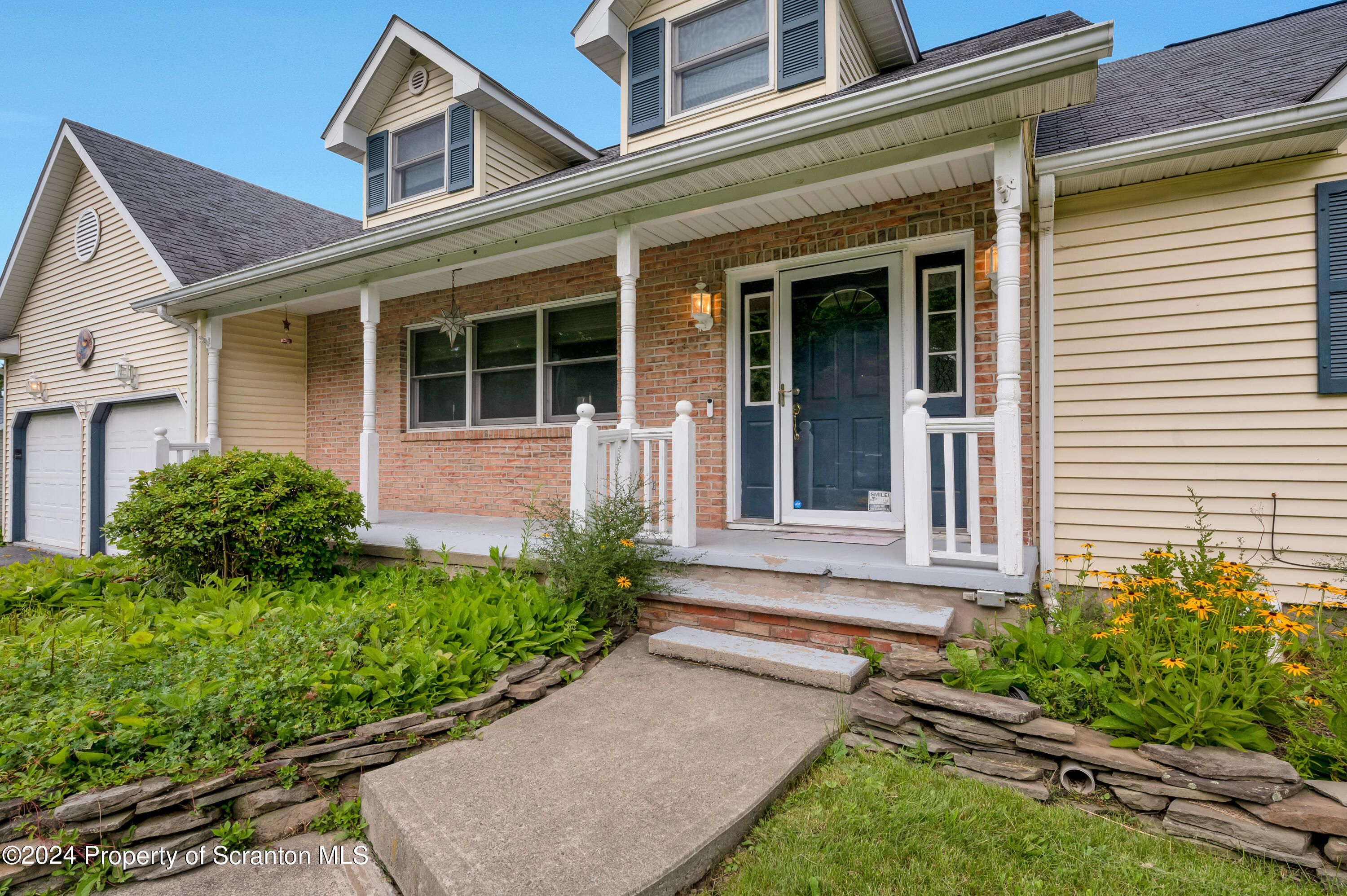 305 Maggies Road, Unit L B Clarks Summit, PA 18411 - Photo 2 of 43 front porch