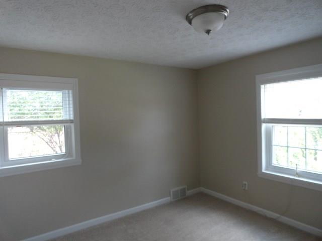 1506 Radford Road Pittsburgh, PA 15227 - Photo 18 of 24 Bedroom #2 is 12x12, two windows for good cross ventilation. Beautiful! Closets in all three Bedrooms offer good storage space.