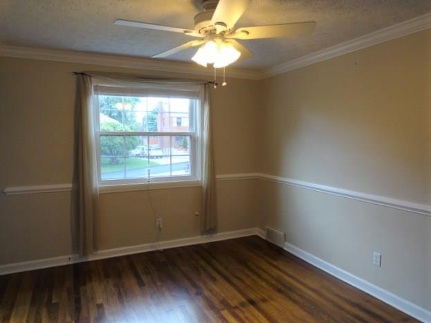 1506 Radford Road Pittsburgh, PA 15227 - Photo 7 of 24 Dining Room is 12x10, very bright, gorgeous floor, with Crown Molding and Chair Rail...Ceiling fan/light.