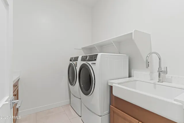 a bathroom with a granite countertop toilet sink mirror and shower