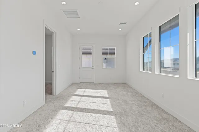 a view of a room with garage and a window