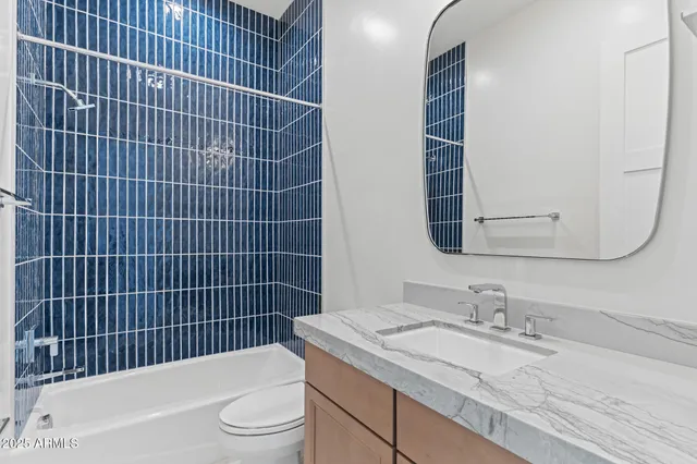 an aerial view of a house with a outdoor space