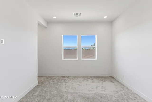 a view of a city with an ocean