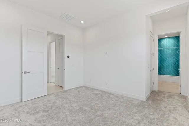 a view of a backyard with sitting area