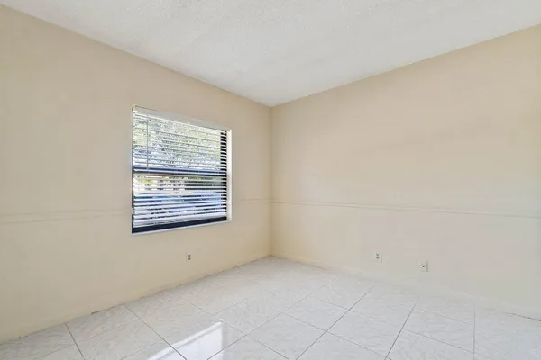 a view of a room that has a window in it