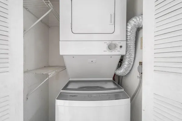 a utility room with washer and dryer