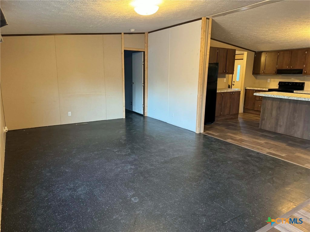 Undisclosed Address Kempner, TX 76539 - Photo 3 of 29 a view of a kitchen with a sink and refrigerator