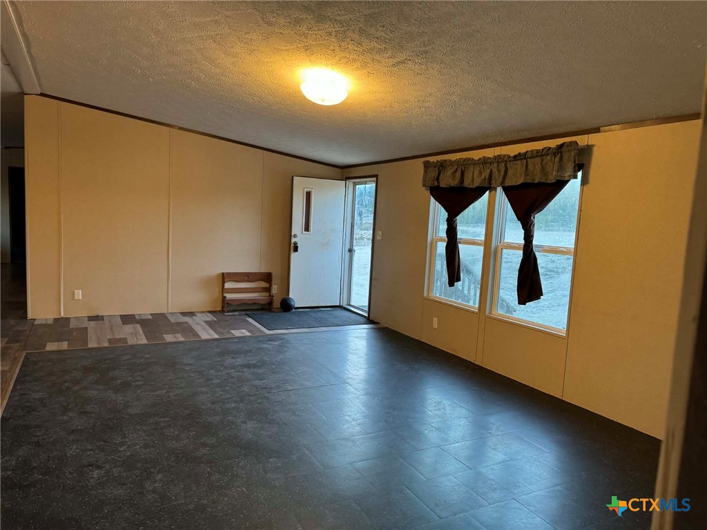 Undisclosed Address Kempner, TX 76539 - Photo 4 of 29 a view of a livingroom with wooden floor
