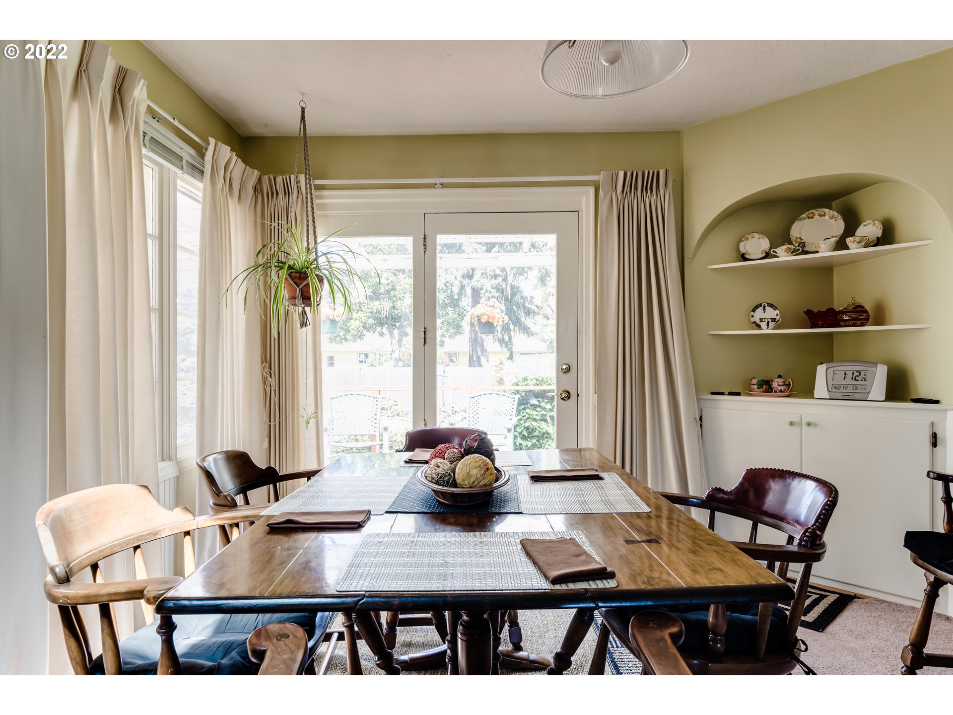 369 Knoop Lane Eugene, OR 97404 - Photo 12 of 32 a view of a dining room with furniture and a window