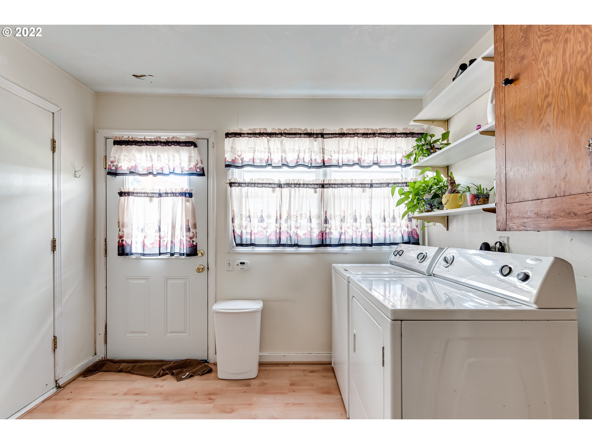 369 Knoop Lane Eugene, OR 97404 - Photo 16 of 32 a kitchen with a sink cabinets and window