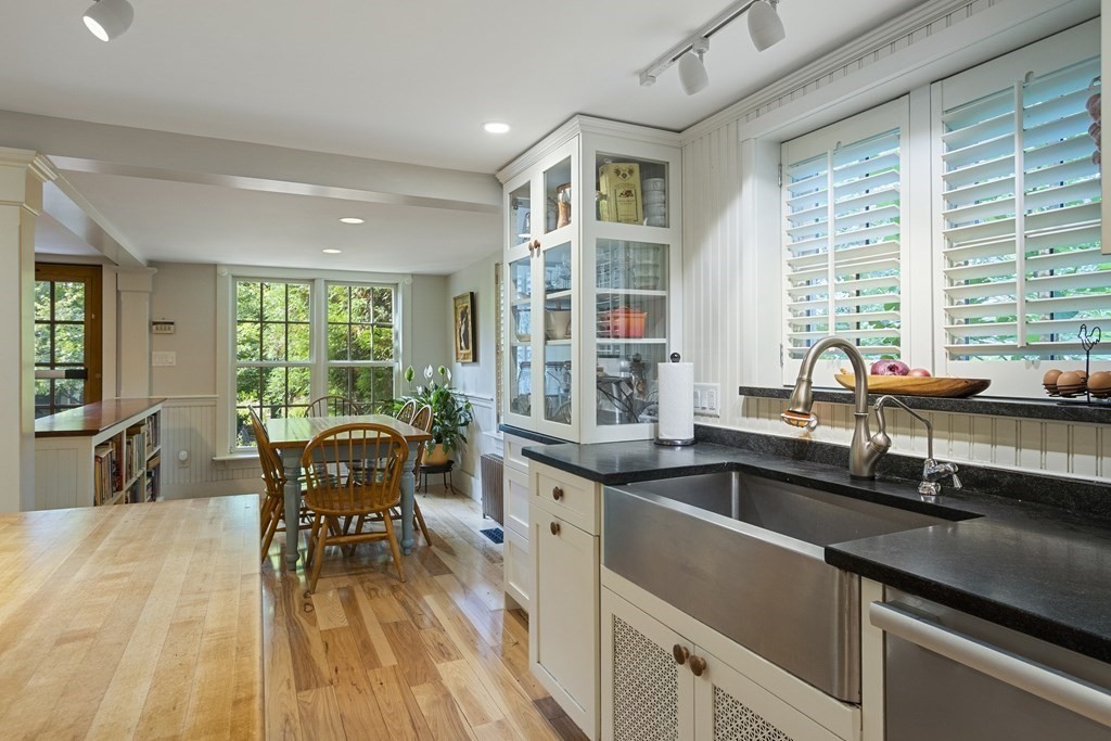 49 Parker Street Lexington, MA 02421 - Photo 11 of 42 a kitchen with stainless steel appliances granite countertop a sink and cabinets