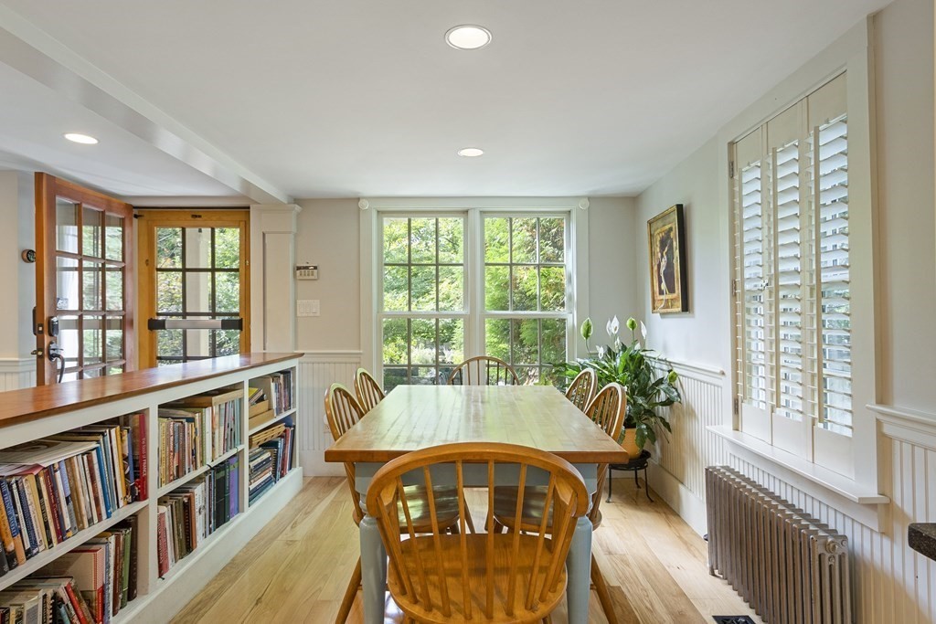 49 Parker Street Lexington, MA 02421 - Photo 12 of 42 a view of a dining room with furniture window and wooden floor