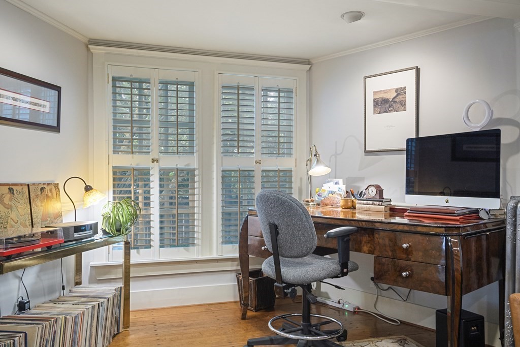 49 Parker Street Lexington, MA 02421 - Photo 13 of 42 a view of a workspace with furniture and a window