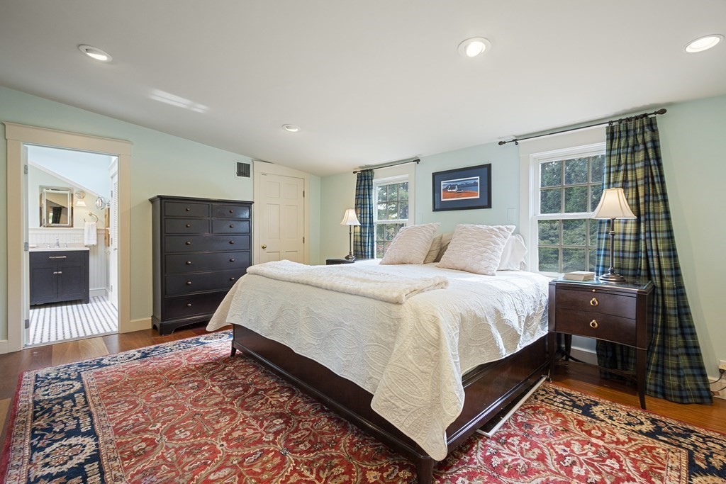 49 Parker Street Lexington, MA 02421 - Photo 16 of 42 a bedroom with a bed and a window