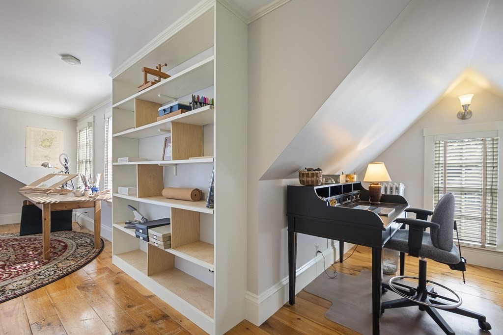 49 Parker Street Lexington, MA 02421 - Photo 19 of 42 a view of a dining room with furniture