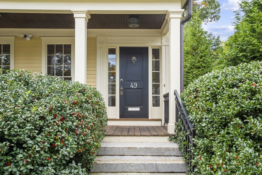 49 Parker Street Lexington, MA 02421 - Photo 2 of 42 front view of a house with potted plants
