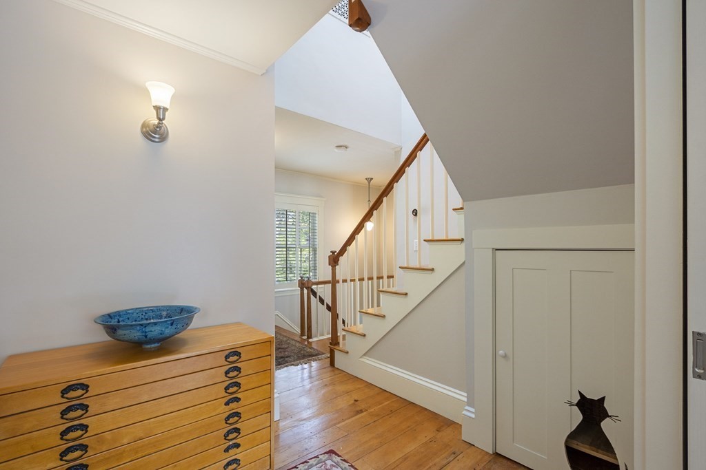 49 Parker Street Lexington, MA 02421 - Photo 21 of 42 a view of entryway and hall with wooden floor