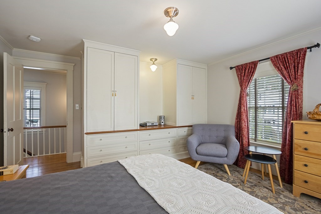 49 Parker Street Lexington, MA 02421 - Photo 23 of 42 a bathroom with a granite countertop sink and a mirror