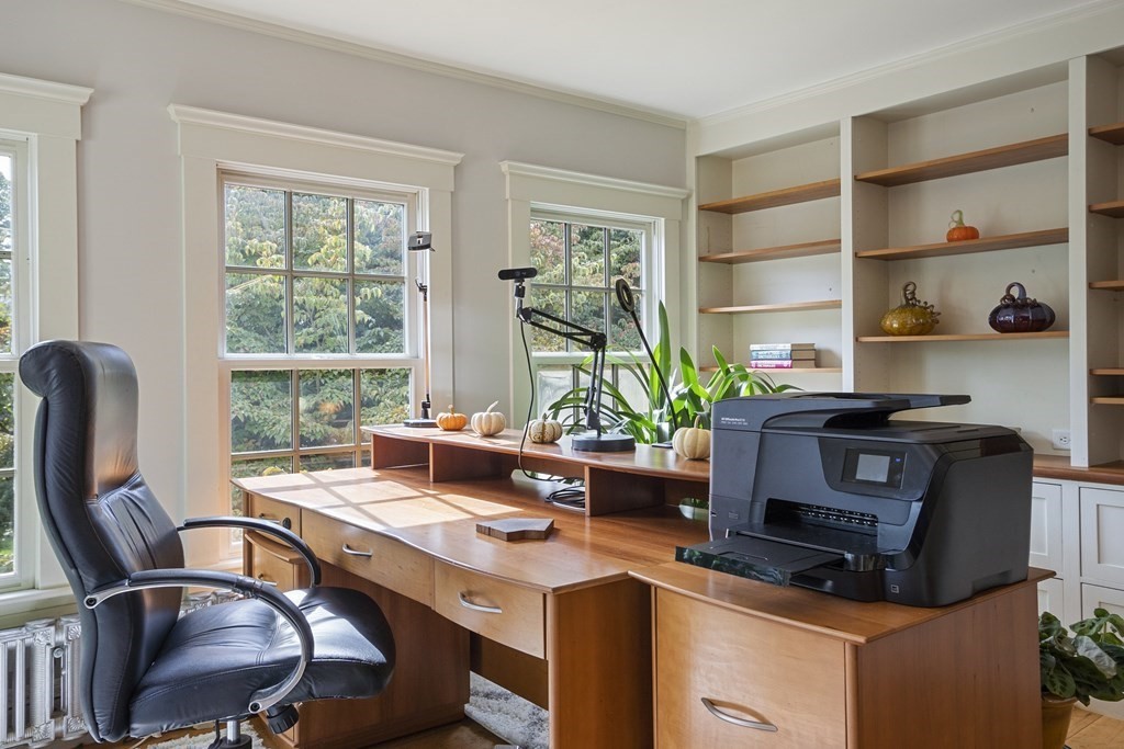 49 Parker Street Lexington, MA 02421 - Photo 25 of 42 a view of a workspace with furniture and a window