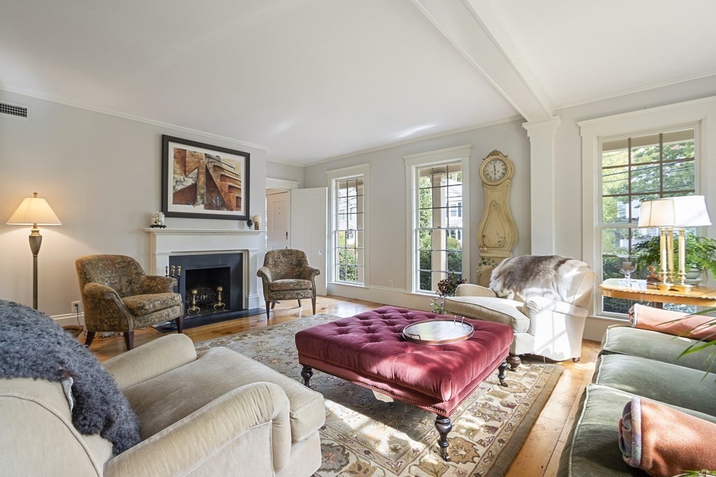 49 Parker Street Lexington, MA 02421 - Photo 3 of 42 a living room with furniture or couch and a fireplace